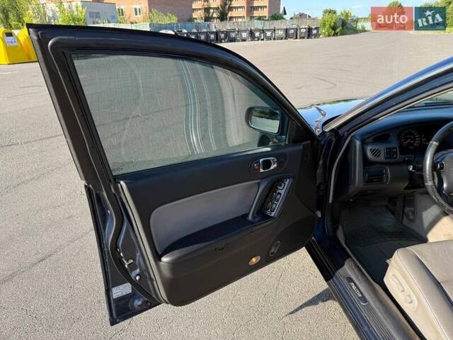Синий Мазда Кседос 9, объемом двигателя 2.5 л и пробегом 285 тыс. км за 3200 $, фото 59 на Automoto.ua