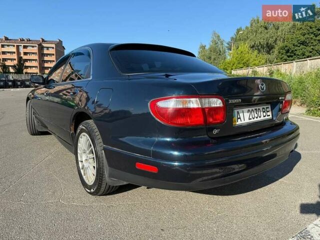 Синий Мазда Кседос 9, объемом двигателя 2.5 л и пробегом 285 тыс. км за 3200 $, фото 76 на Automoto.ua
