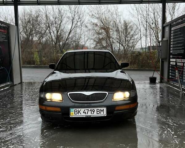 Зелений Мазда Кседос 9, об'ємом двигуна 2.5 л та пробігом 360 тис. км за 2700 $, фото 1 на Automoto.ua