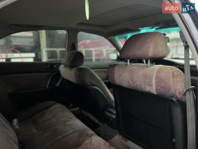 Зелений Мазда Кседос 9, об'ємом двигуна 2.5 л та пробігом 360 тис. км за 2700 $, фото 8 на Automoto.ua