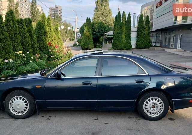 Зеленый Мазда Кседос 9, объемом двигателя 2.5 л и пробегом 270 тыс. км за 1730 $, фото 3 на Automoto.ua