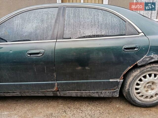 Зеленый Мазда Кседос 9, объемом двигателя 2.5 л и пробегом 354 тыс. км за 1500 $, фото 23 на Automoto.ua