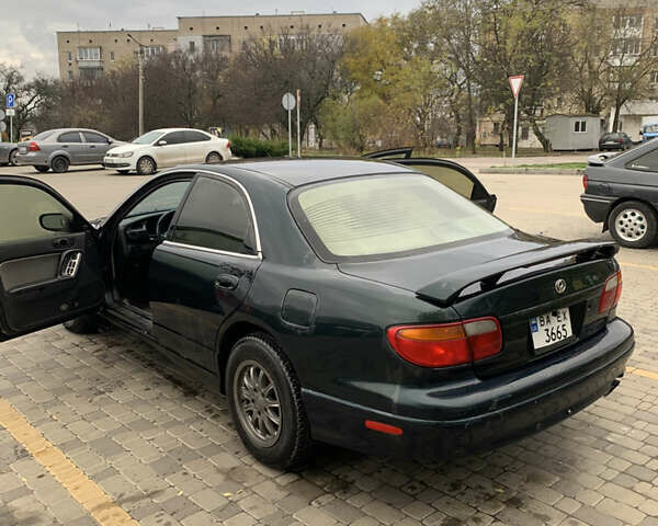 Зелений Мазда Кседос 9, об'ємом двигуна 2.5 л та пробігом 394 тис. км за 2200 $, фото 9 на Automoto.ua