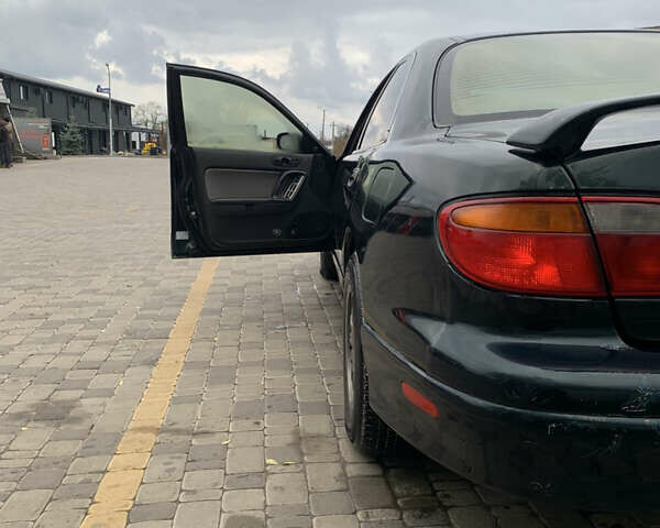 Зелений Мазда Кседос 9, об'ємом двигуна 2.5 л та пробігом 394 тис. км за 2200 $, фото 8 на Automoto.ua