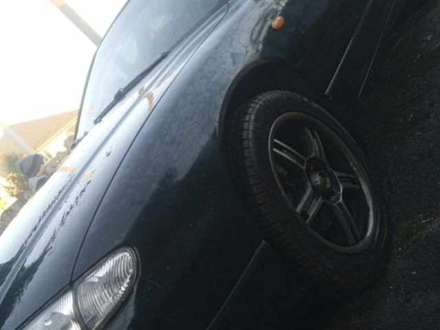 Зеленый Мазда Кседос 9, объемом двигателя 2.5 л и пробегом 1000 тыс. км за 2500 $, фото 1 на Automoto.ua