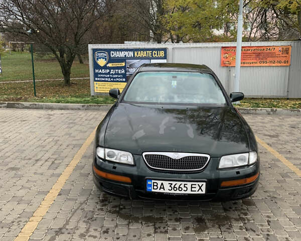 Зелений Мазда Кседос 9, об'ємом двигуна 2.5 л та пробігом 394 тис. км за 2200 $, фото 22 на Automoto.ua