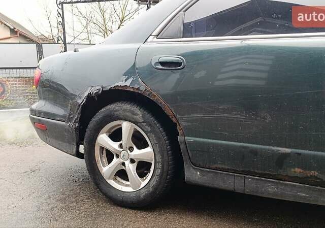 Зеленый Мазда Кседос 9, объемом двигателя 2.5 л и пробегом 354 тыс. км за 1500 $, фото 4 на Automoto.ua