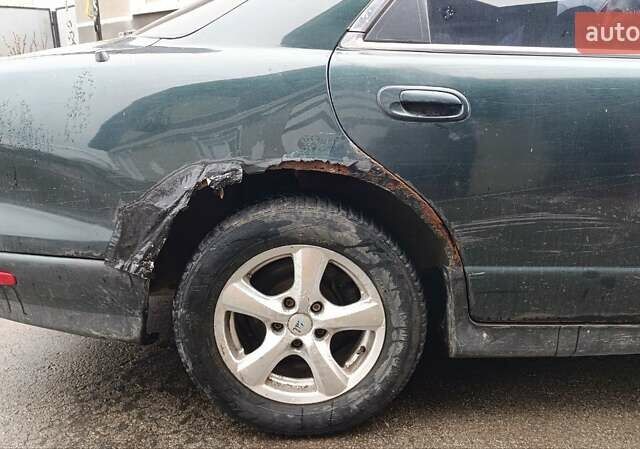 Зеленый Мазда Кседос 9, объемом двигателя 2.5 л и пробегом 354 тыс. км за 1500 $, фото 3 на Automoto.ua