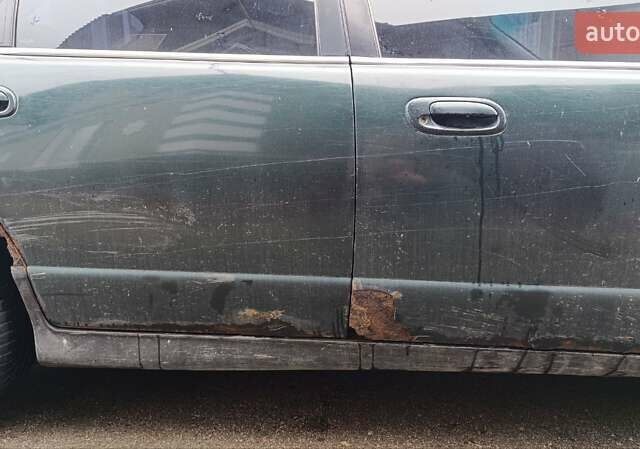 Зеленый Мазда Кседос 9, объемом двигателя 2.5 л и пробегом 354 тыс. км за 1500 $, фото 6 на Automoto.ua