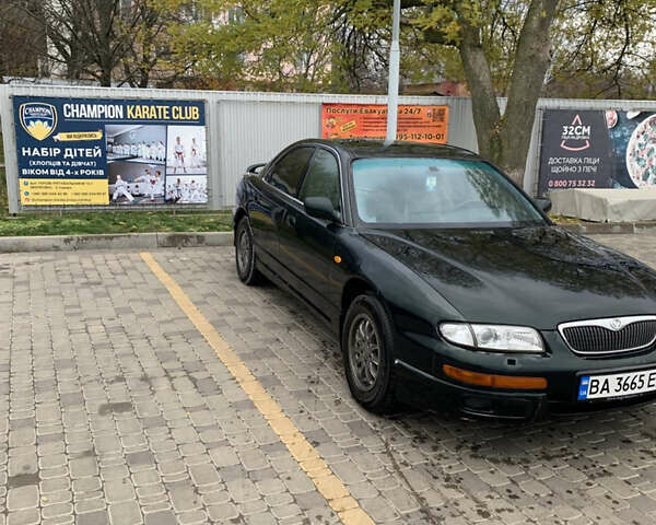 Зелений Мазда Кседос 9, об'ємом двигуна 2.5 л та пробігом 394 тис. км за 2200 $, фото 3 на Automoto.ua