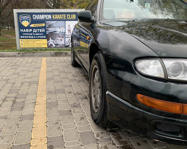 Зелений Мазда Кседос 9, об'ємом двигуна 2.5 л та пробігом 394 тис. км за 2200 $, фото 21 на Automoto.ua