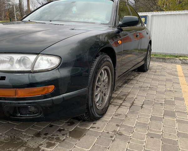 Зелений Мазда Кседос 9, об'ємом двигуна 2.5 л та пробігом 394 тис. км за 2200 $, фото 20 на Automoto.ua