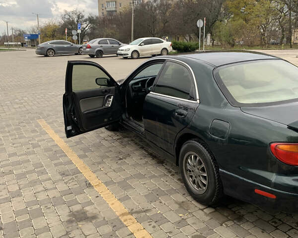 Зелений Мазда Кседос 9, об'ємом двигуна 2.5 л та пробігом 394 тис. км за 2200 $, фото 16 на Automoto.ua