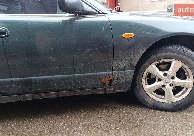 Зеленый Мазда Кседос 9, объемом двигателя 2.5 л и пробегом 354 тыс. км за 1500 $, фото 5 на Automoto.ua