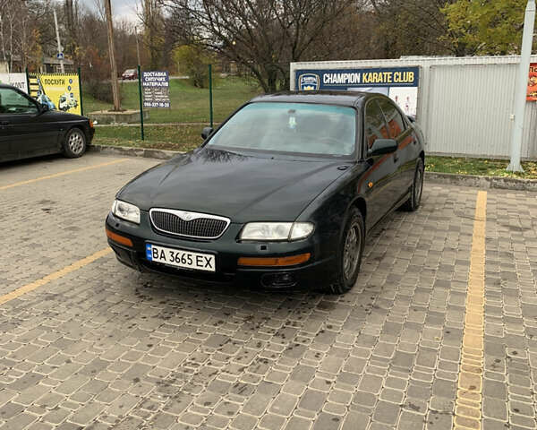 Зелений Мазда Кседос 9, об'ємом двигуна 2.5 л та пробігом 394 тис. км за 2200 $, фото 1 на Automoto.ua