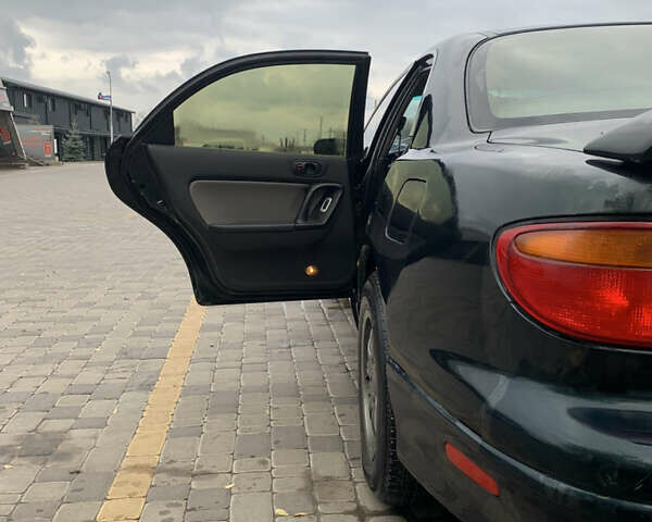 Зелений Мазда Кседос 9, об'ємом двигуна 2.5 л та пробігом 394 тис. км за 2200 $, фото 26 на Automoto.ua