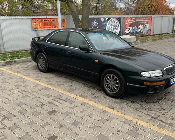 Зелений Мазда Кседос 9, об'ємом двигуна 2.5 л та пробігом 394 тис. км за 2200 $, фото 7 на Automoto.ua