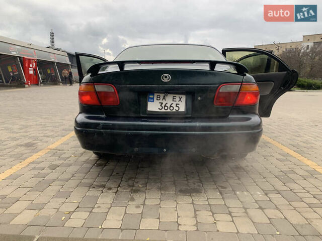 Зелений Мазда Кседос 9, об'ємом двигуна 2.5 л та пробігом 394 тис. км за 2200 $, фото 10 на Automoto.ua