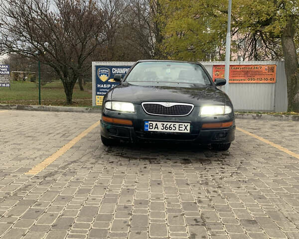 Зелений Мазда Кседос 9, об'ємом двигуна 2.5 л та пробігом 394 тис. км за 2200 $, фото 18 на Automoto.ua