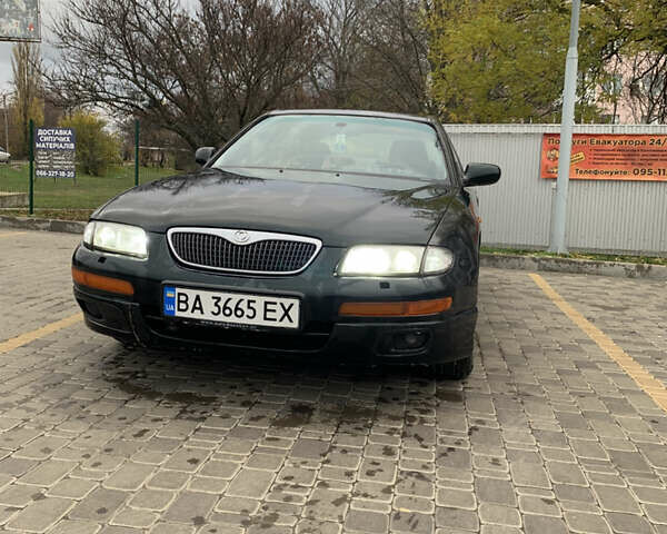 Зелений Мазда Кседос 9, об'ємом двигуна 2.5 л та пробігом 394 тис. км за 2200 $, фото 19 на Automoto.ua