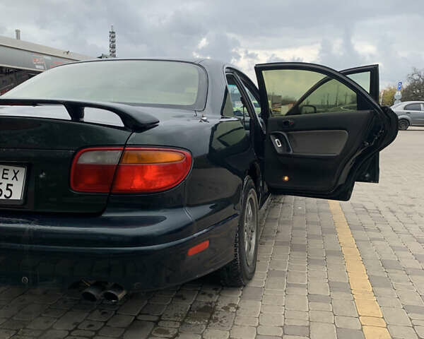 Зелений Мазда Кседос 9, об'ємом двигуна 2.5 л та пробігом 394 тис. км за 2200 $, фото 11 на Automoto.ua