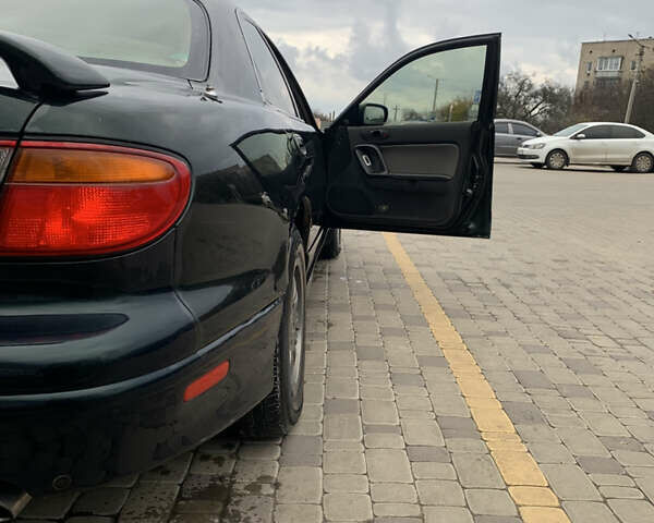 Зелений Мазда Кседос 9, об'ємом двигуна 2.5 л та пробігом 394 тис. км за 2200 $, фото 12 на Automoto.ua