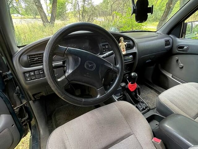 Зелений Мазда B 2500, об'ємом двигуна 2.5 л та пробігом 174 тис. км за 5880 $, фото 5 на Automoto.ua