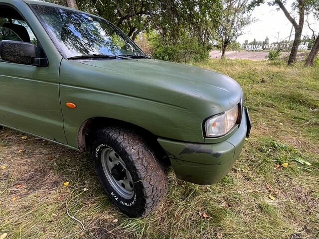 Зелений Мазда B 2500, об'ємом двигуна 2.5 л та пробігом 174 тис. км за 5880 $, фото 2 на Automoto.ua