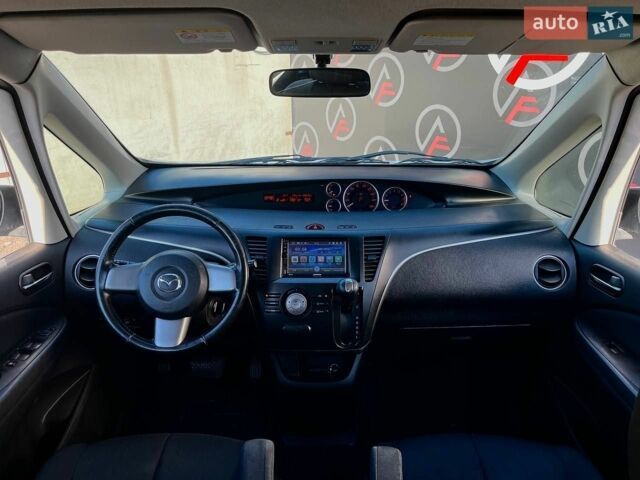 Білий Мазда Biante, об'ємом двигуна 2 л та пробігом 138 тис. км за 12990 $, фото 17 на Automoto.ua