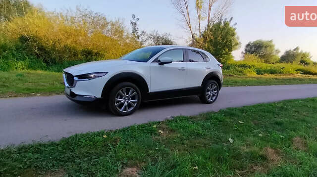 Белый Мазда CX-30, объемом двигателя 2 л и пробегом 115 тыс. км за 18300 $, фото 4 на Automoto.ua