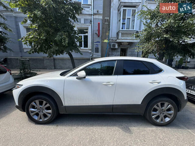 Білий Мазда CX-30, об'ємом двигуна 2.49 л та пробігом 100 тис. км за 22000 $, фото 1 на Automoto.ua