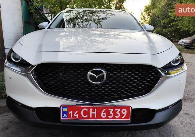Белый Мазда CX-30, объемом двигателя 2.5 л и пробегом 106 тыс. км за 18800 $, фото 3 на Automoto.ua