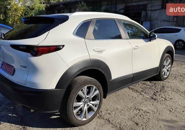Белый Мазда CX-30, объемом двигателя 2.5 л и пробегом 106 тыс. км за 18800 $, фото 5 на Automoto.ua