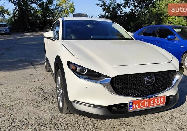 Белый Мазда CX-30, объемом двигателя 2.5 л и пробегом 106 тыс. км за 18800 $, фото 6 на Automoto.ua
