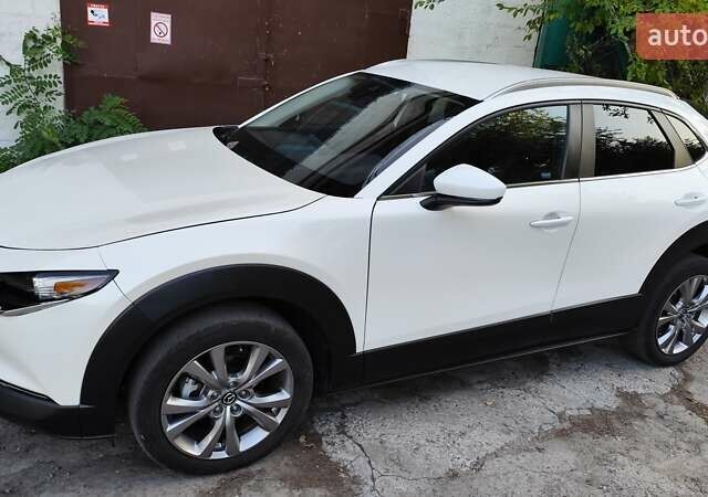 Белый Мазда CX-30, объемом двигателя 2.5 л и пробегом 106 тыс. км за 18800 $, фото 1 на Automoto.ua