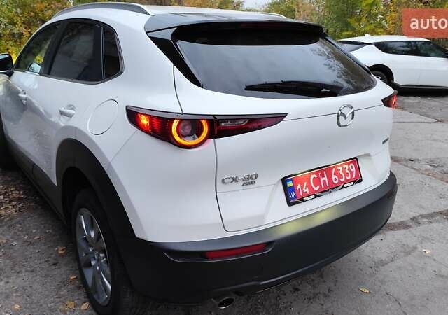 Белый Мазда CX-30, объемом двигателя 2.5 л и пробегом 106 тыс. км за 17400 $, фото 16 на Automoto.ua