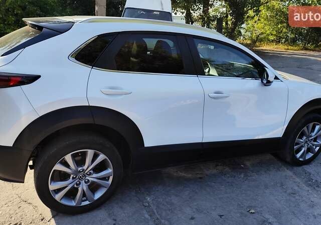 Белый Мазда CX-30, объемом двигателя 2.5 л и пробегом 106 тыс. км за 18800 $, фото 14 на Automoto.ua