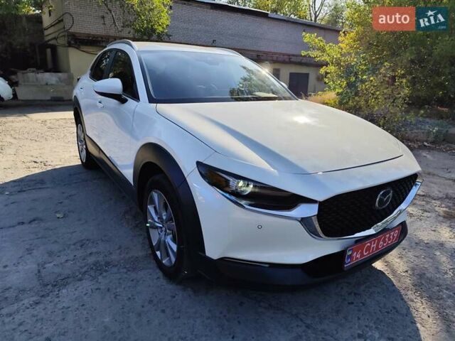 Белый Мазда CX-30, объемом двигателя 2.5 л и пробегом 106 тыс. км за 18800 $, фото 16 на Automoto.ua