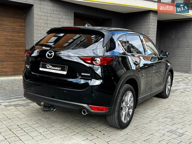 Черный Мазда CX-30, объемом двигателя 2.2 л и пробегом 140 тыс. км за 24500 $, фото 17 на Automoto.ua