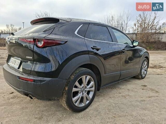 Черный Мазда CX-30, объемом двигателя 2 л и пробегом 56 тыс. км за 19500 $, фото 3 на Automoto.ua