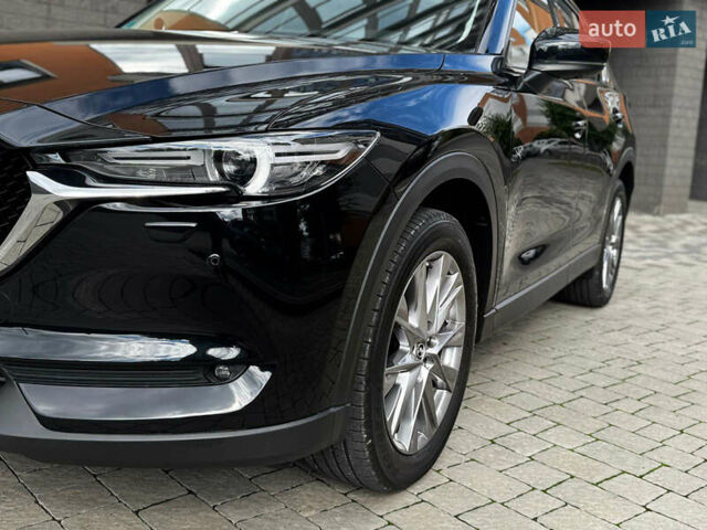 Черный Мазда CX-30, объемом двигателя 2.2 л и пробегом 140 тыс. км за 24500 $, фото 7 на Automoto.ua