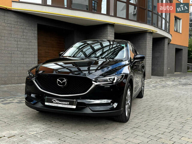 Черный Мазда CX-30, объемом двигателя 2.2 л и пробегом 140 тыс. км за 24500 $, фото 2 на Automoto.ua