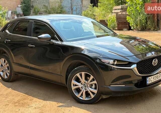Чорний Мазда CX-30, об'ємом двигуна 2.49 л та пробігом 101 тис. км за 17500 $, фото 7 на Automoto.ua