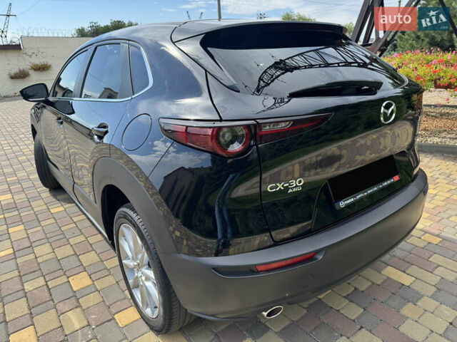Черный Мазда CX-30, объемом двигателя 2.49 л и пробегом 105 тыс. км за 19500 $, фото 7 на Automoto.ua