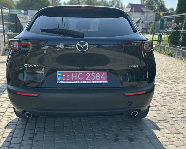 Черный Мазда CX-30, объемом двигателя 0 л и пробегом 80 тыс. км за 19999 $, фото 3 на Automoto.ua