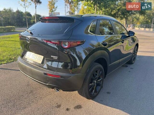 Черный Мазда CX-30, объемом двигателя 2.49 л и пробегом 96 тыс. км за 18900 $, фото 4 на Automoto.ua