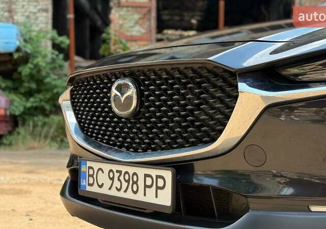 Чорний Мазда CX-30, об'ємом двигуна 2.49 л та пробігом 101 тис. км за 17500 $, фото 6 на Automoto.ua