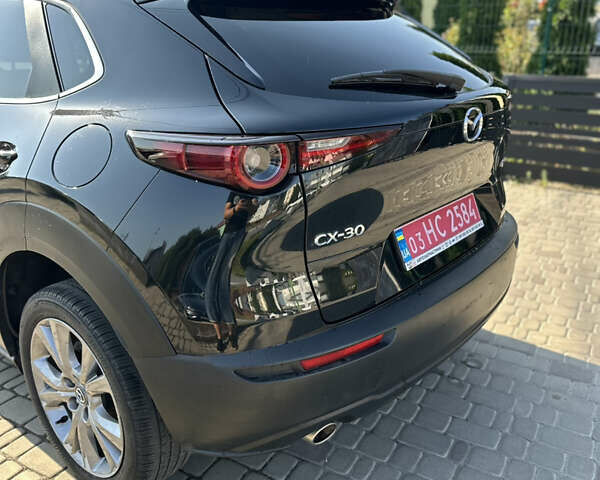 Черный Мазда CX-30, объемом двигателя 0 л и пробегом 80 тыс. км за 19999 $, фото 7 на Automoto.ua
