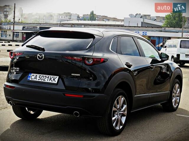 Черный Мазда CX-30, объемом двигателя 2.5 л и пробегом 17 тыс. км за 19700 $, фото 2 на Automoto.ua