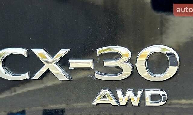 Чорний Мазда CX-30, об'ємом двигуна 2.49 л та пробігом 15 тис. км за 25299 $, фото 48 на Automoto.ua